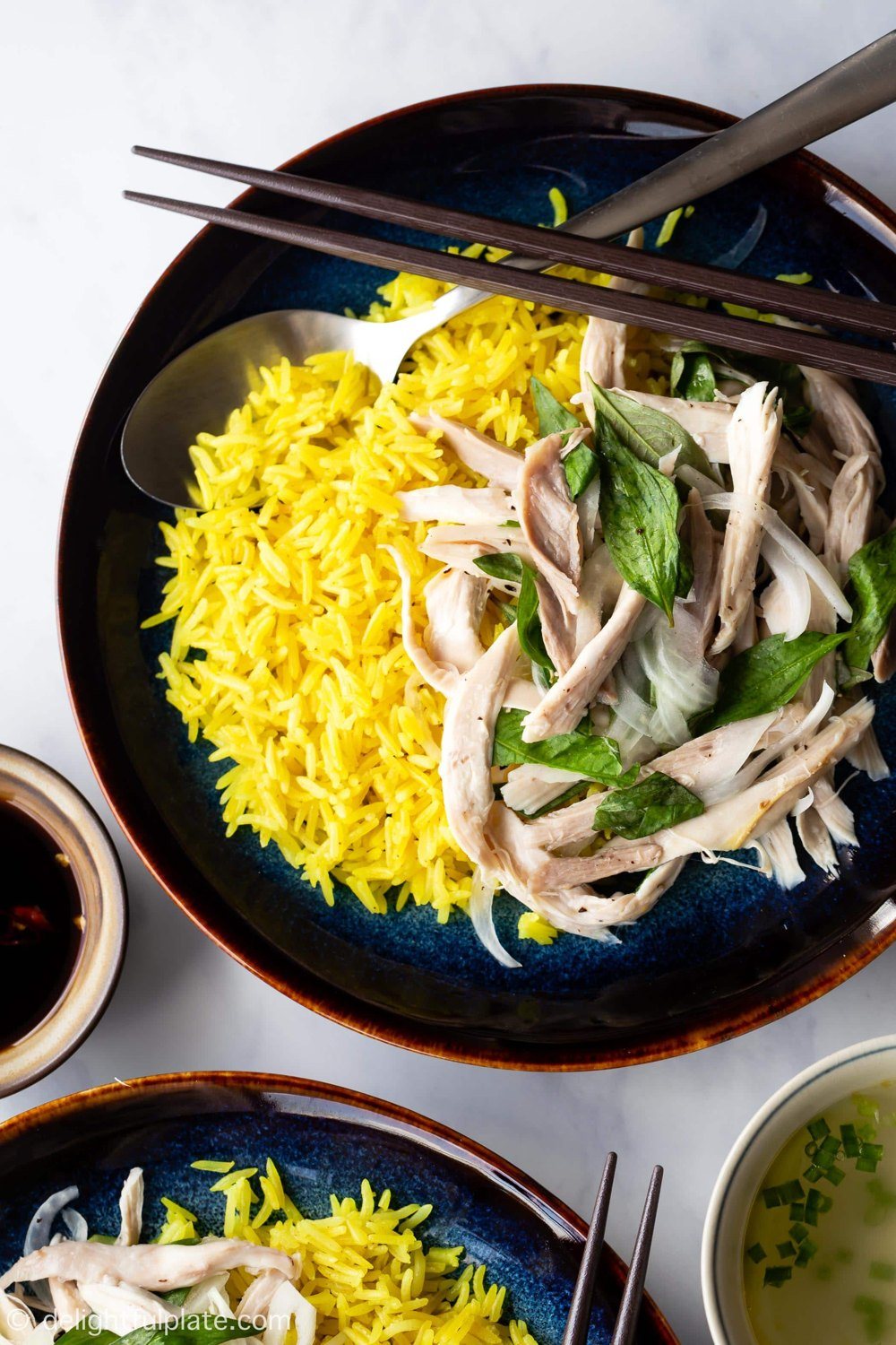 Vietnamese turmeric rice with shredded chicken and herbs