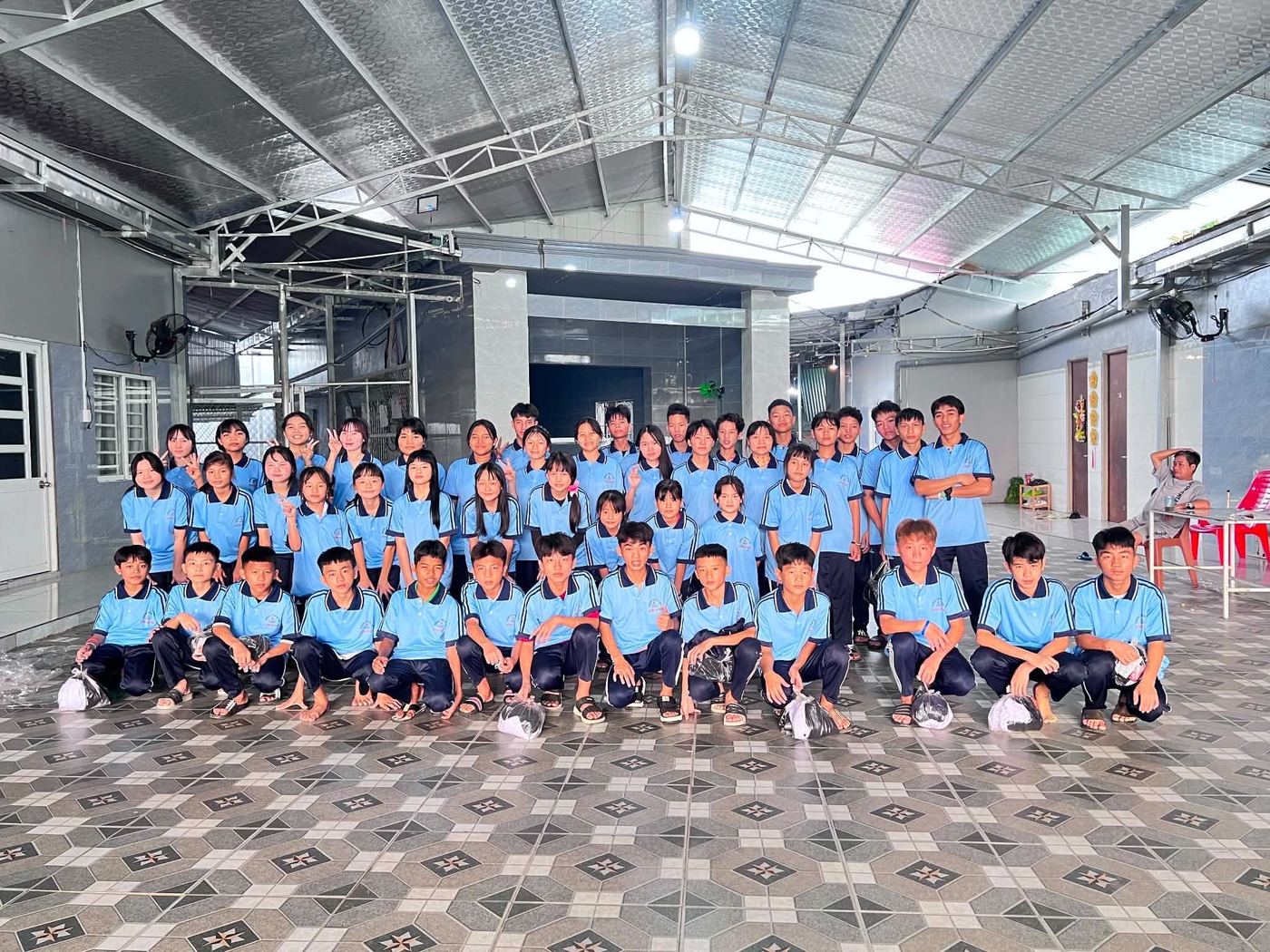The children in their new school uniforms