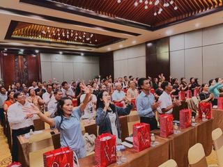 Pastors worshiping in the conference hall