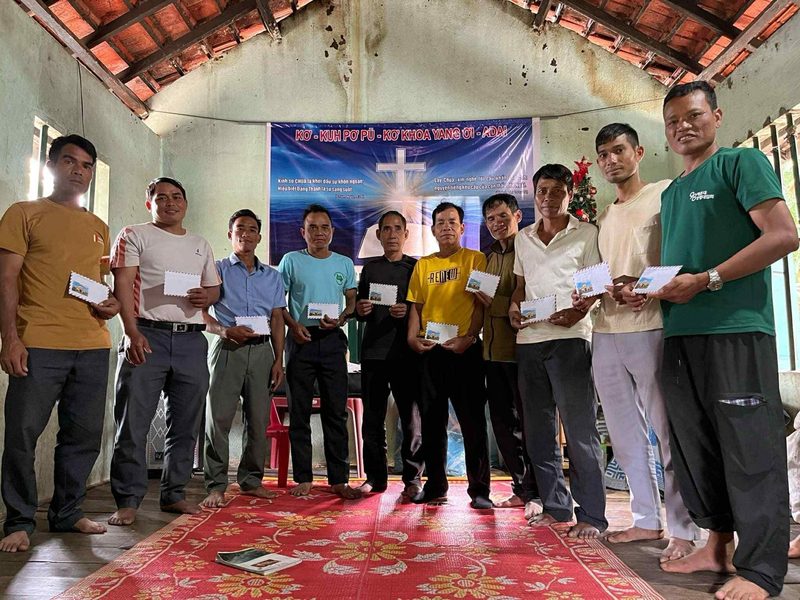 National pastors standing together in a church in Vietnam