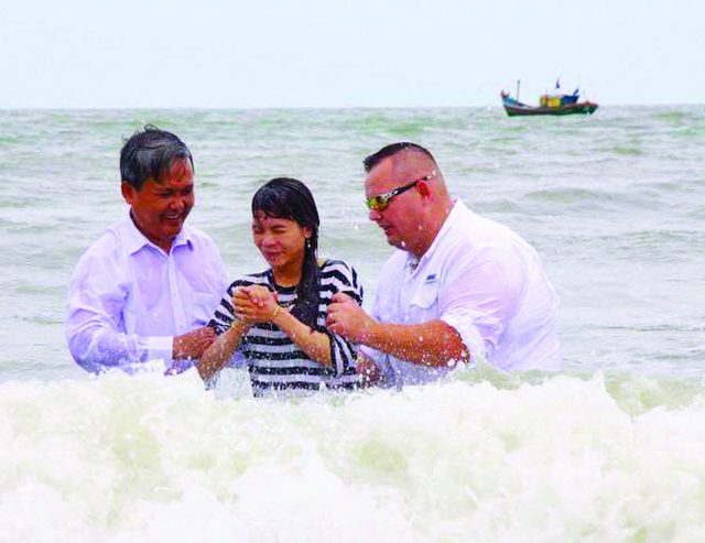 Photo from the report: Baptism